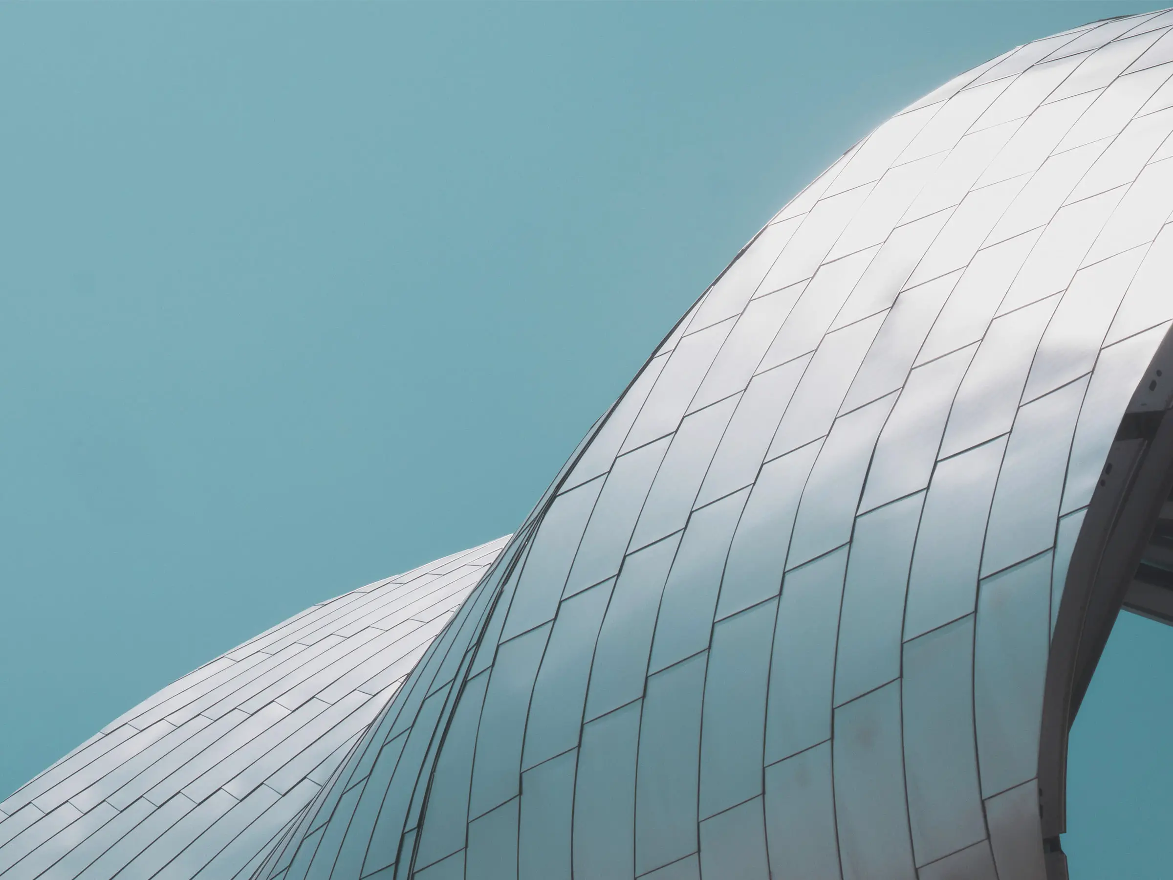 Silver shingled curved dome